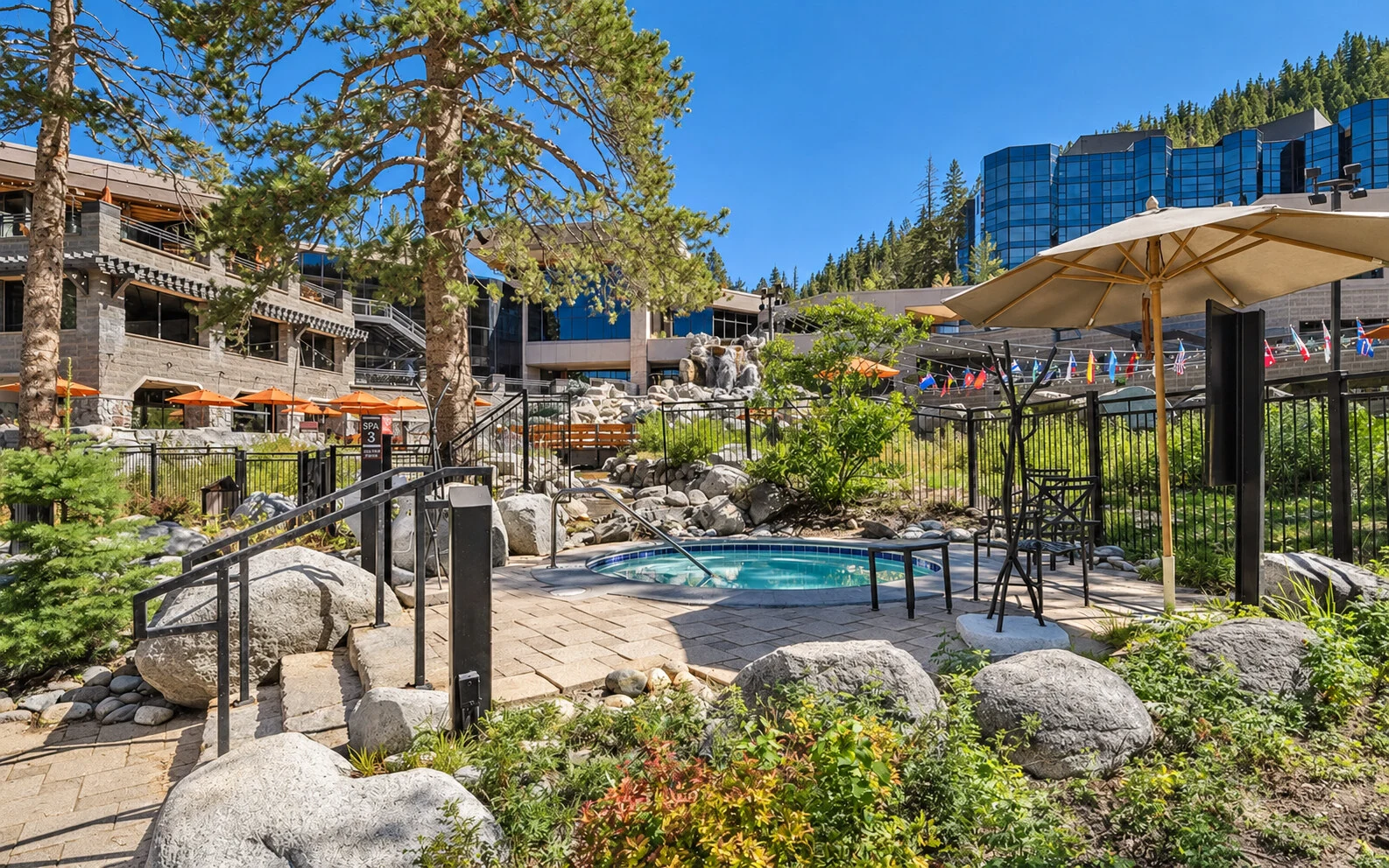 Everline resort grounds with water features and mountain surroundings