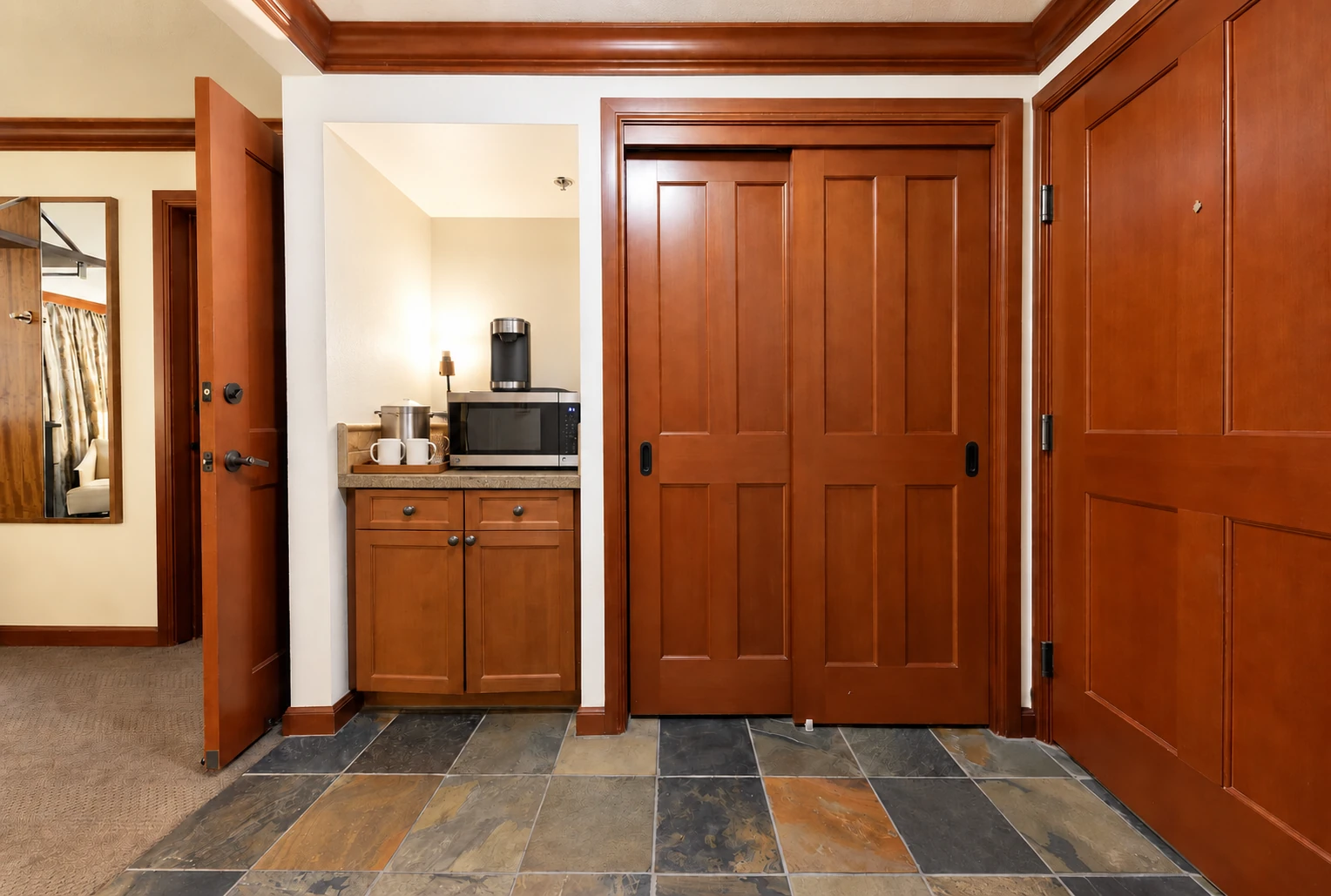King room — Entry & coffee area; digitally styled linens and accessories