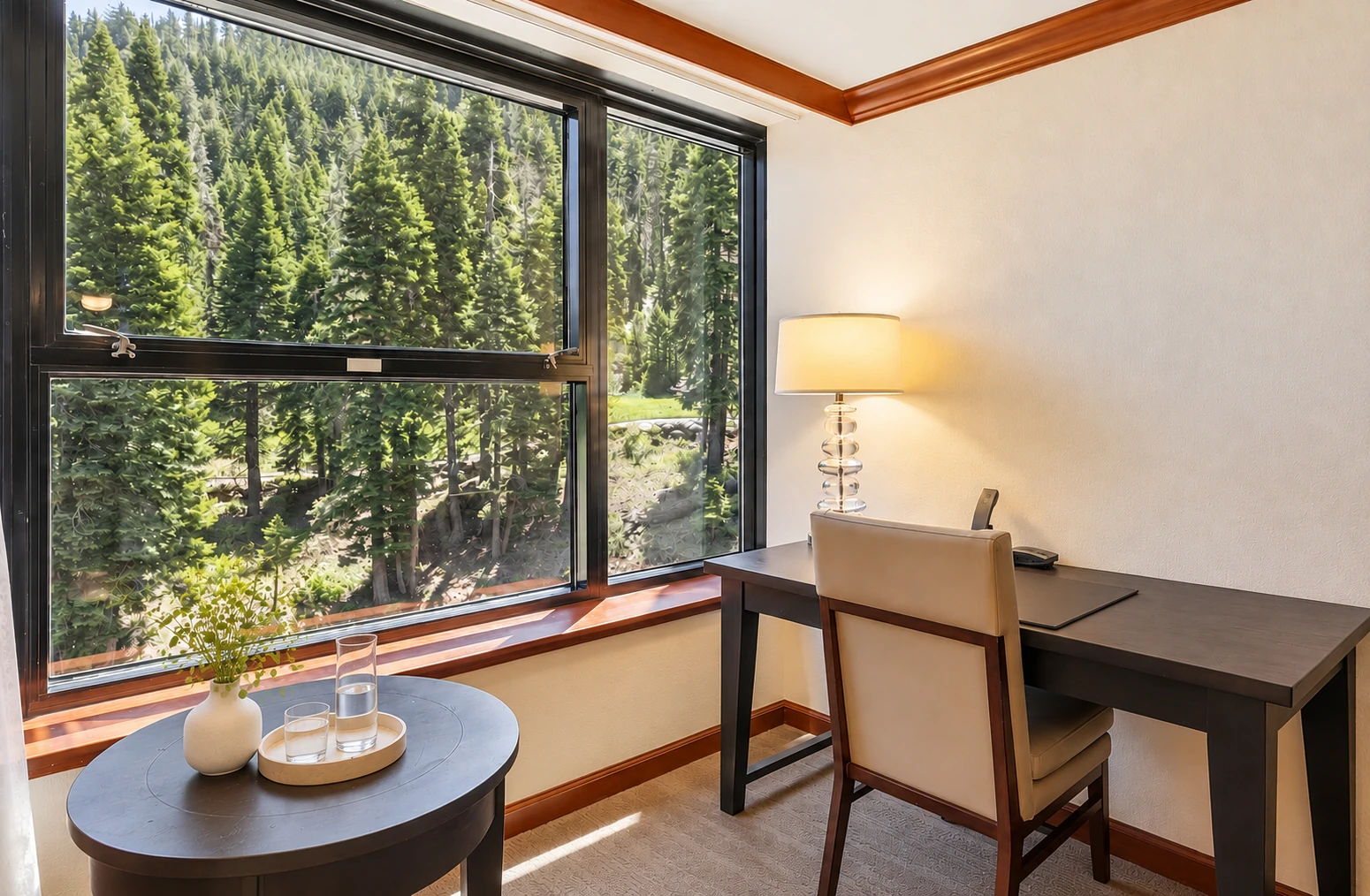 King room — Desk & forest outlook; digitally styled linens and accessories