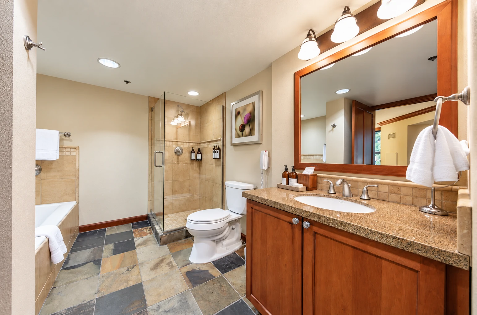 One-bedroom suite — Suite bathroom; digitally styled linens and accessories